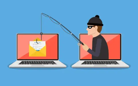 Ein Hacker versucht mit einer Angel, Zugangsdaten von einem Laptop zu stehlen. Ein Symbol für online betrug.