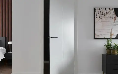 Nowoczesne białe drzwi wewnętrzne aranżacje. Minimalistyczny design, czarna klamka, stylowy dodatek do wnętrza.