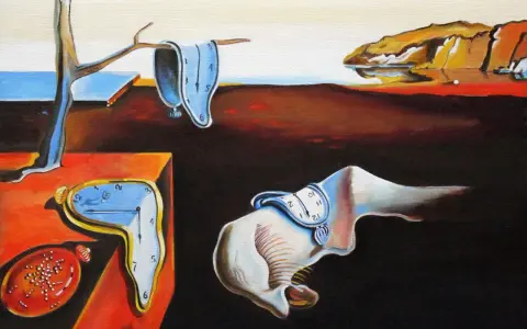 Salvador Dalí "Trwałość pamięci" - surrealistyczny krajobraz z topiącymi się zegarami, symbolem ulotności czasu.