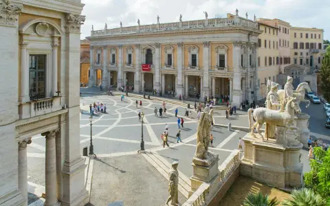 Piazza del Campidoglio, Rome, with the Capitoline Museums' facade and statues.