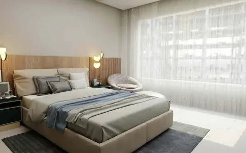 Habitación con cabecero bajo ventana, ideal para un feng shui habitacion cabecero bajo ventana. Cama confortable, silla acogedora y luz natural.