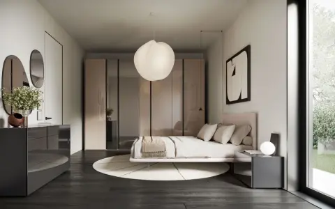 Camera da letto con letto rosa, armadi a specchio e comò grigio. Un'ispirazione per arredare casa moderna elegante con stile e raffinatezza.