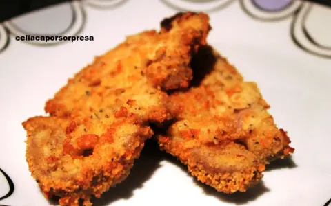 Delicioso escalope de ternera empanado, crujiente y dorado, listo para disfrutar.