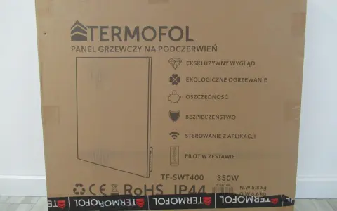 Kartonowe opakowanie panelu grzewczego na podczerwień Termofol. Choć nie widać wad, opakowanie sugeruje ekologiczne i oszczędne ogrzewanie.