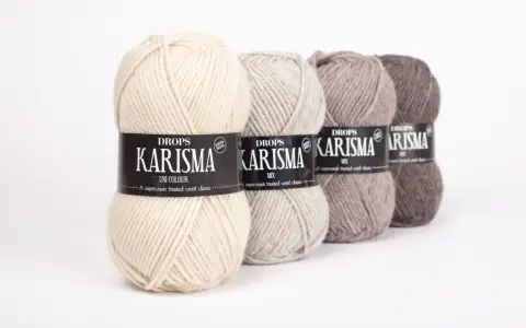 Fyra nystan Drops Karisma i olika jordnära färger. Perfekt garn för att sticka något som inte kliar.