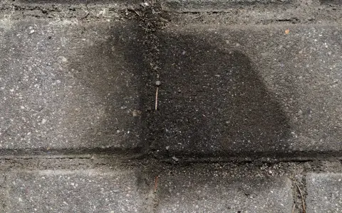 Jak usunąć asfalt z kostki brukowej - skuteczne metody i porady