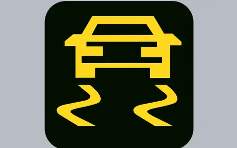 Gelbes Symbol eines Autos auf rutschiger Straße. ESP Knopf Auto leuchtet auf, wenn Traktion verloren geht.