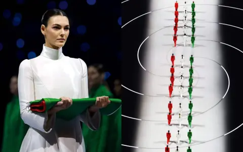 Vittoria Ceretti, con un abito bianco, tiene un fascio di bandiere tricolore. Sullo sfondo, atleti in fila con i colori italiani, un'evocazione della vittoria alle Olimpiadi.