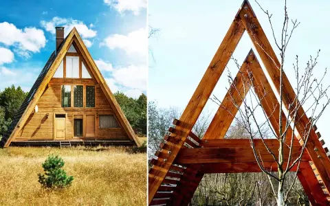 Maison en bois en forme de A, un style architectural qui pourrait influencer le prix maison en a. Structure en bois avec des poutres apparentes.