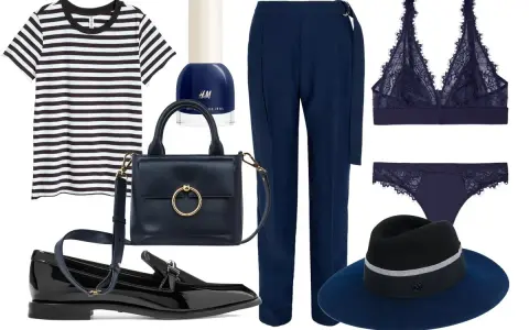 Conjunto elegante: camiseta a rayas, pantalón azul marino, lencería de encaje, bolso, zapatos y sombrero. El azul y negro combinan a la perfección.