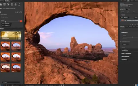 Interface d'un logiciel retouche photo automatique, montrant un paysage désertique à travers une arche rocheuse. Des filtres prédéfinis sont visibles sur la gauche.