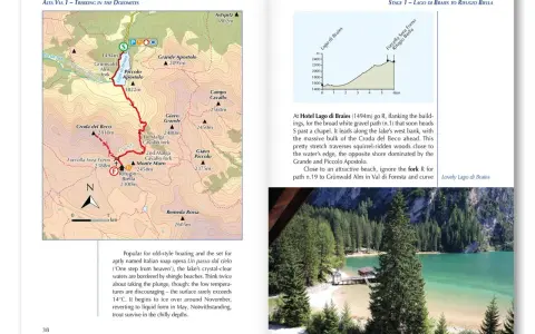 Mapa szlaku Alta Via 1 przez Dolomity, prowadzącego do Lago di Braies. Widok na jezioro i góry.