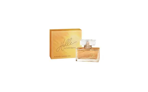 Perfumy Halle Berry: flakon i pudełko z pomarańczowym gradientem.