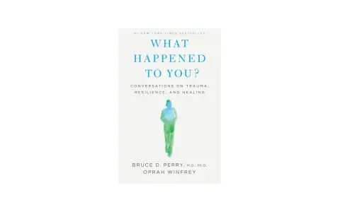 Okładka książki "What Happened to You?" z sylwetką człowieka. Dowiadujemy się, co ci się przydarzyło, by zrozumieć siebie.