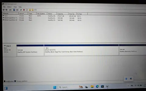 Zrzut ekranu z narzędzia Zarządzanie dyskami w systemie Windows, pokazujący partycje dysku C, EFI i odzyskiwania.