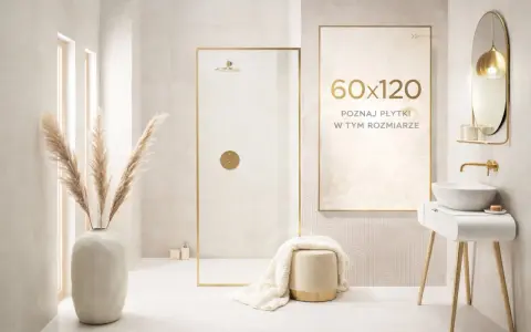 Elegancka łazienka z prysznicem i umywalką. Na ścianie plakat "60x120 poznaj płytki w tym rozmiarze".