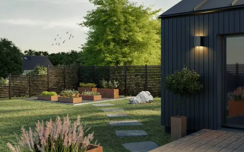 En modern trädgård med odlingslådor och en stenlagd gång leder till framsida hus entre.