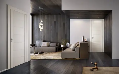 Interni moderni con infissi marroni e porte bianche. Un salotto accogliente con divani grigi, tappeto beige e un'elegante lampada a sospensione.