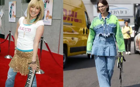 A young woman in a sparkly skirt over jeans poses on a red carpet. Another woman walks in a denim jacket with neon green sleeves, also wearing a skirt over jeans.