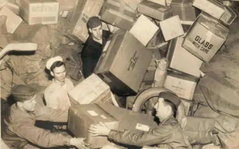 Gitarre per DHL versenden: Kosten, Verpackung & Versicherung (Anleitung)