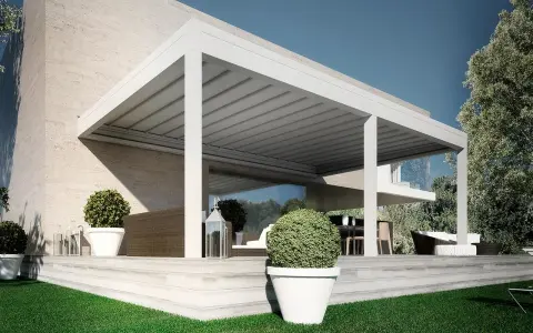Pergolato fai da te economico, moderno e funzionale, con arredi da esterno e piante in vaso su una terrazza in pietra.
