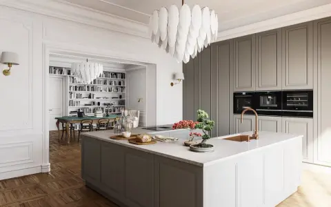 Elegante cucina stile parigino con isola centrale, mobili grigi, elettrodomestici a scomparsa e un'ampia libreria sullo sfondo.