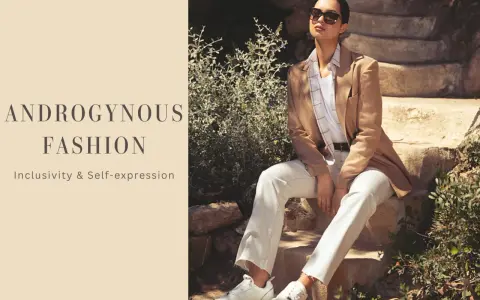 Mujer con estilo andrógino, viste blazer y pantalones blancos, transmitiendo inclusividad y autoexpresión.