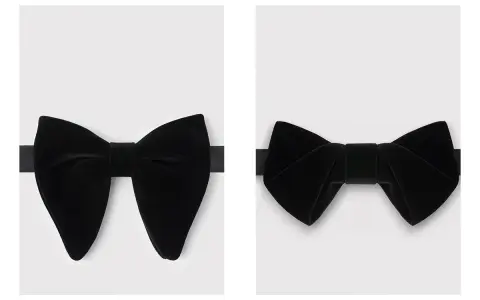Dwie czarne, aksamitne muchy. Jedna szeroka, druga bardziej klasyczna. Elegancka mucha czy krawat?
