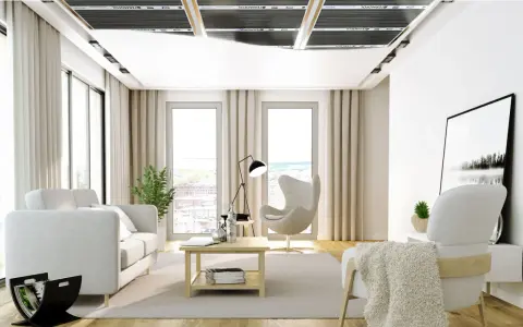 Nowoczesny salon z ogrzewaniem sufitowym. Jasne meble, duże okna i dyskretne panele grzewcze tworzą przytulną atmosferę.