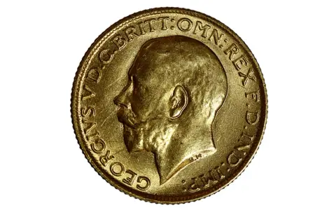 Moneta d'oro 917, che corrisponde a 22 carati, con il profilo di Re Giorgio V.