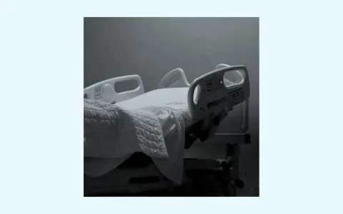 An empty hospital bed, a symbol of loss and unanswered questions. Does God forgive suicide? This image evokes the pain and uncertainty surrounding such a tragedy.