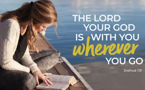 A young woman reads her Bible by the water, finding comfort in trusting God in difficult times with verses like Joshua 1:9.