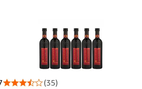 Sechs Flaschen Grand Sud Grenache Rotwein, lieblich ausgebaut, mit roten Etiketten und schwarzer Kappe.