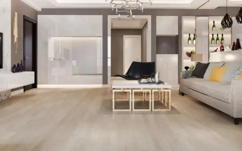 Suelos de madera clara, ideales para casas modernas. Un salón elegante con sofá, mesa de centro y estanterías.