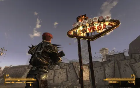 Un personaje con armadura improvisada mira el icónico letrero "Welcome to Fabulous Las Vegas" en un páramo desolado, típico de Fallout New Vegas.