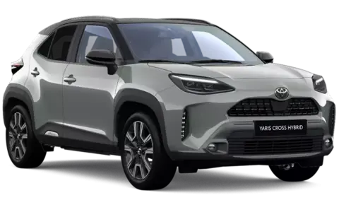 Srebrny Toyota Yaris Cross Hybrid z czarnym dachem, prezentujący nowoczesny design i hybrydowy napęd.