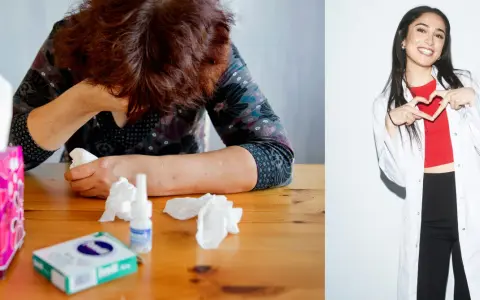 Kvinna med feber och näsdukar på bordet, bredvid en glad läkare som gör hjärta med händerna.
