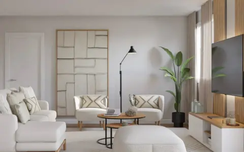 Salón moderno con sofá y sillones blancos, mesa de centro, planta y TV. Ideas para como decorar un salón con muebles blancos.