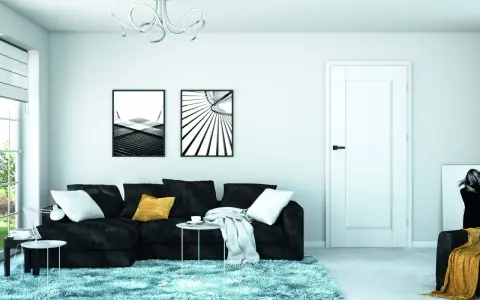 Nowoczesny salon z czarną kanapą, niebieskim dywanem i białymi drzwiami bezprzylgowymi dre.