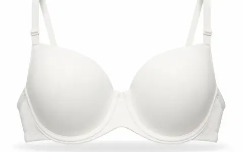 Reggiseno bianco con coppe piene, ideale per un seno sesta misura, offre supporto e comfort.