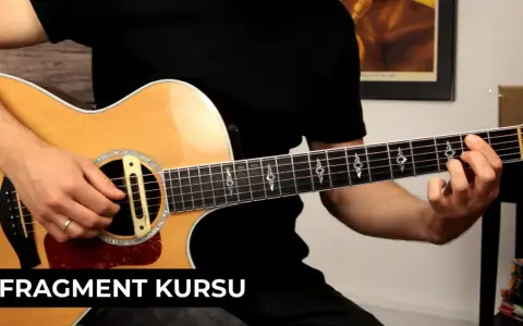 Fragment kursu: czy gra na gitarze jest trudna? Ręka na gryfie, palce układają akord.