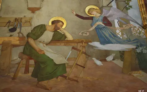 Ein Engel erscheint dem schlafenden Josef, der als der vater von Jesus gilt, und verkündet ihm die Botschaft.