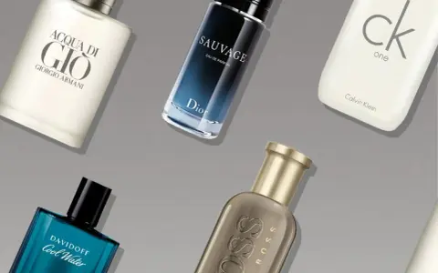 Fünf Flakons mit Herrendüften: Acqua di Gio, Sauvage, CK One, Cool Water, Boss.