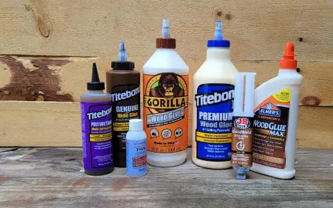 A collection of wood glues, including Gorilla Wood Glue and Titebond, are displayed. The question of what is the strongest adhesive glue is posed.