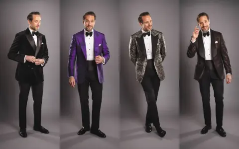 Four men in tuxedos. The first has a black velvet tuxedo with a satin lapel. The second wears a vibrant purple tuxedo. The third sports a patterned jacket with a black lapel. The fourth has a dark patterned tuxedo.