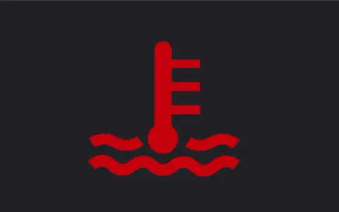 Piloto de advertencia rojo: termómetro sumergido en agua, indica sobrecalentamiento del líquido refrigerante.