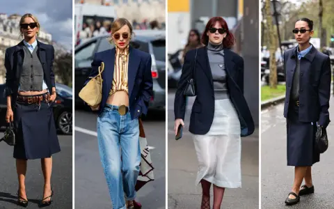 Quattro donne sfoggiano un elegante abbinamento giacca blu con gonne o jeans, dimostrando versatilità e stile.