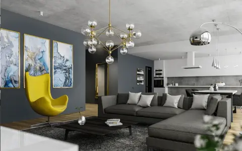 Nowoczesny salon z szarą kanapą i żółtym fotelem. Jak rozjaśnić ciemny pokój? Jasne obrazy i designerska lampa dodają światła.