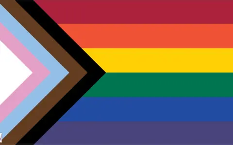 Progress Pride flag with stripes of red, orange, yellow, green, blue, and purple, plus a chevron of white, pink, light blue, brown, and black. This symbolizes inclusivity, suggesting Belize is gay friendly.