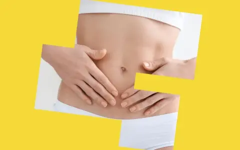 Dłonie na brzuchu, symbolizujące potencjalne maślan sodu skutki uboczne, takie jak dyskomfort.